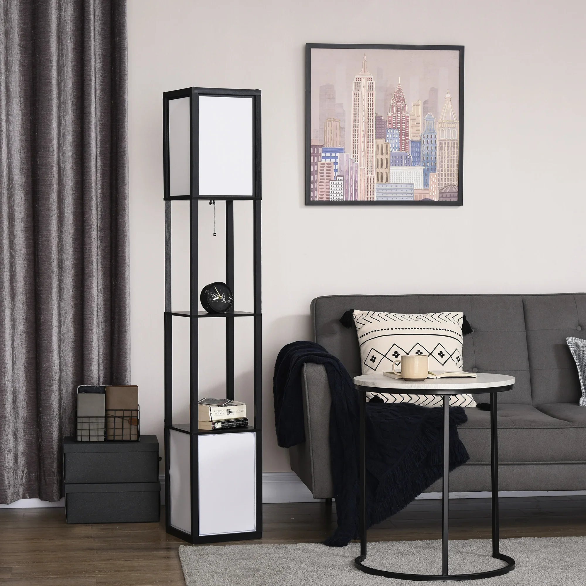 Modern floor lamp with shelves in a stylish living room, next to a gray sofa and cityscape art.