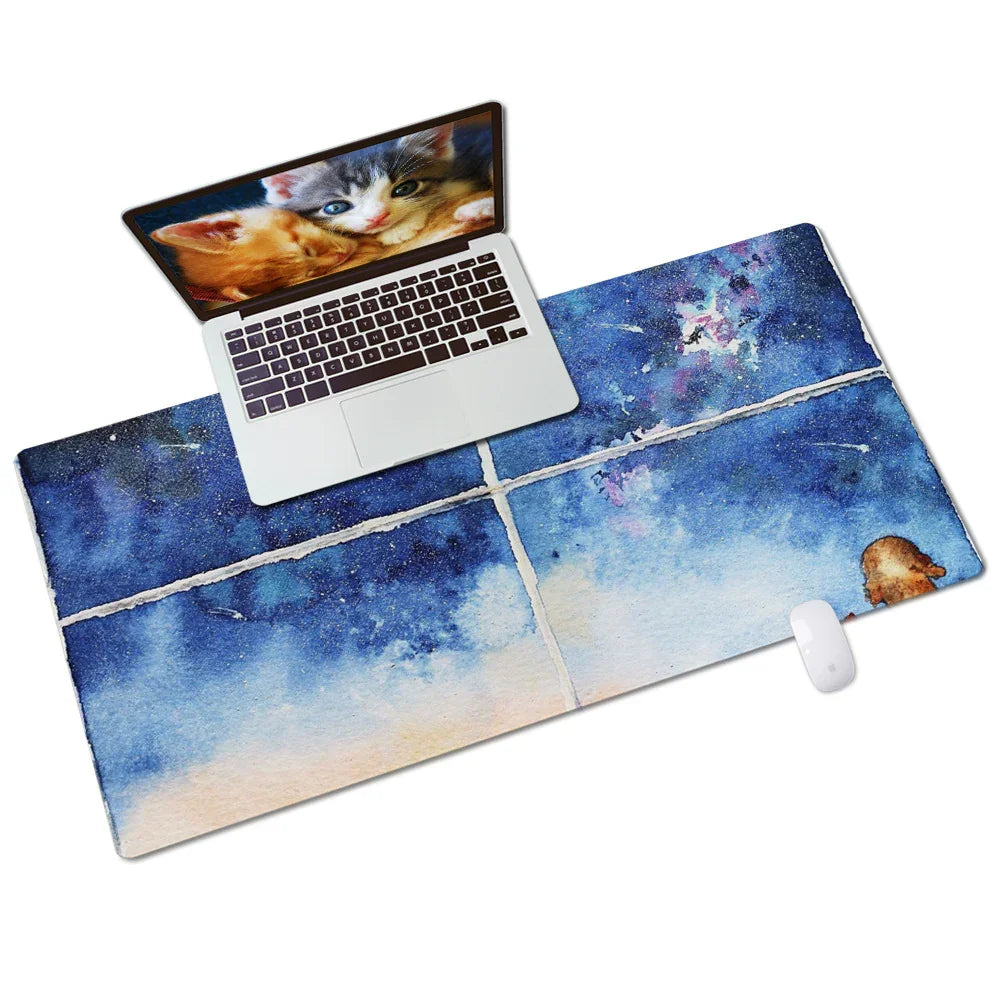 Colorful watercolor desk mat with laptop and wireless mouse, ideal for modern workspace decor