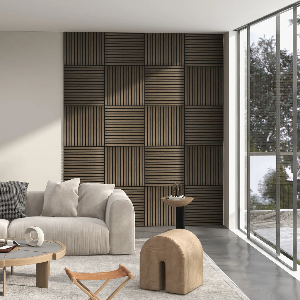 Modern living room with beige sofa, geometric wood accent wall, large windows, and minimalist decor