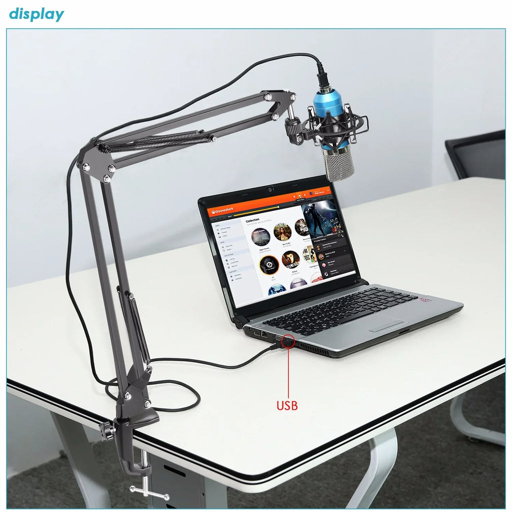 USB condenser microphone on adjustable arm stand connected to laptop for streaming or recording